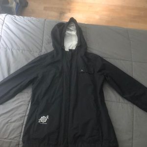 Paradox rain jacket, size small, black color exterior white interior